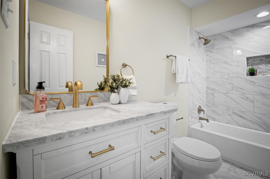 6920 Belmont Road Chesterfield, VA 23832 - Photo 39 of 50 Full bathroom with vanity, toilet, and tiled showe