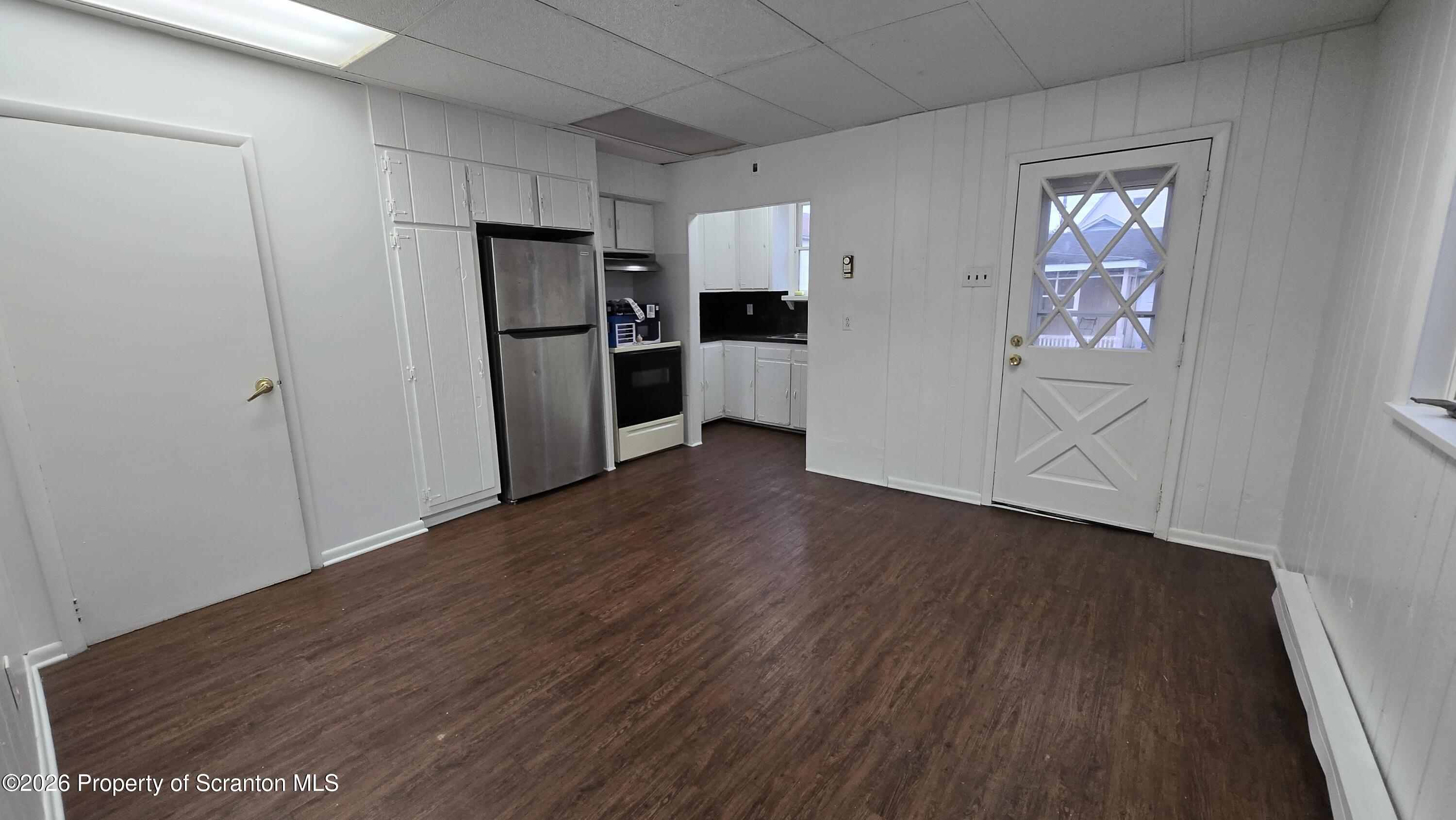 1026 Meade Avenue Scranton, PA 18508 - Photo 6 of 12 a view of kitchen with wooden floor electronic appliances and cabinets