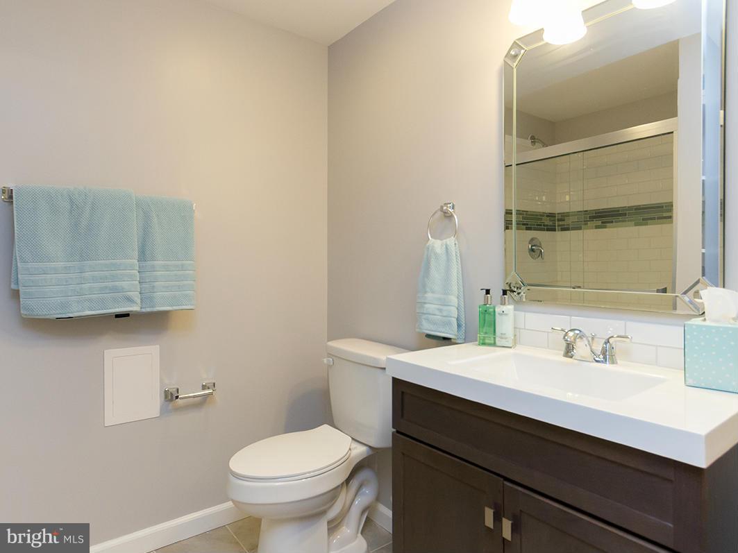 3810 Sweet Air Road Phoenix, MD 21131 - Photo 2 of 30 a bathroom with a sink a toilet and mirror