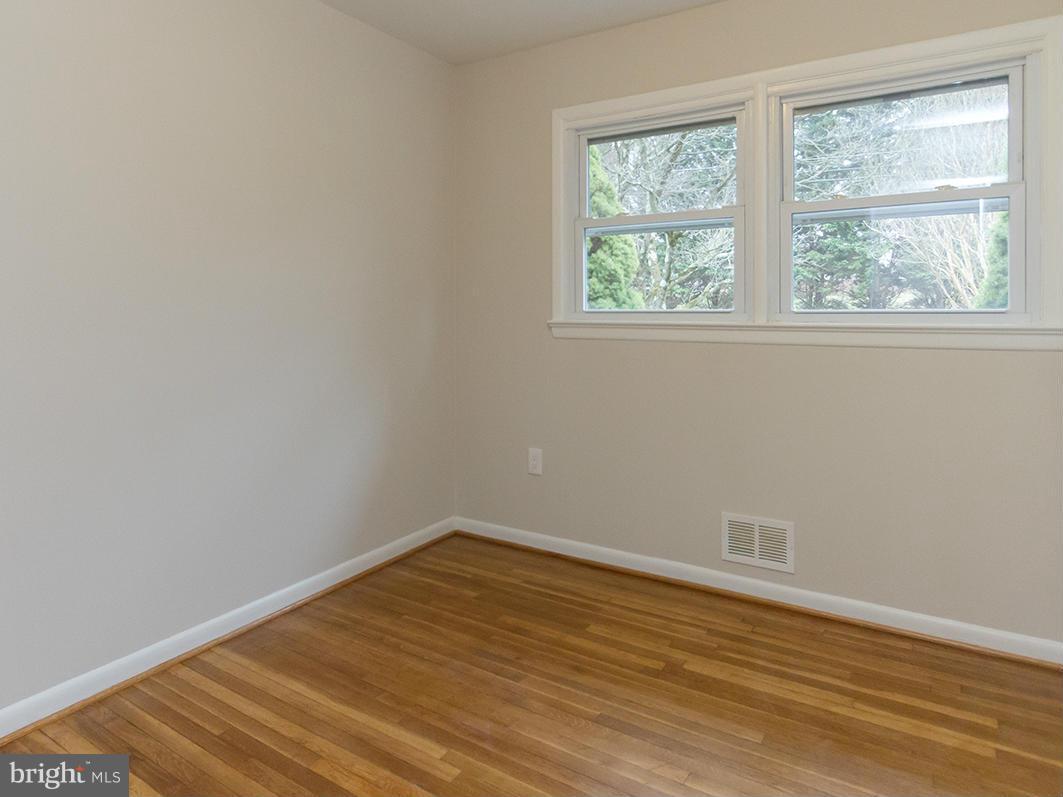 3810 Sweet Air Road Phoenix, MD 21131 - Photo 18 of 30 wooden floor in an empty room with a window