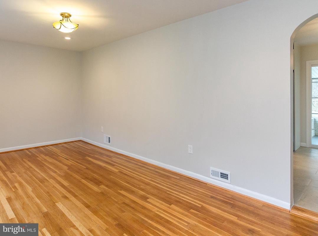 3810 Sweet Air Road Phoenix, MD 21131 - Photo 24 of 30 an empty room with a chandelier fan