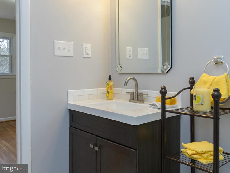 3810 Sweet Air Road Phoenix, MD 21131 - Photo 6 of 30 a bathroom with a sink and a mirror