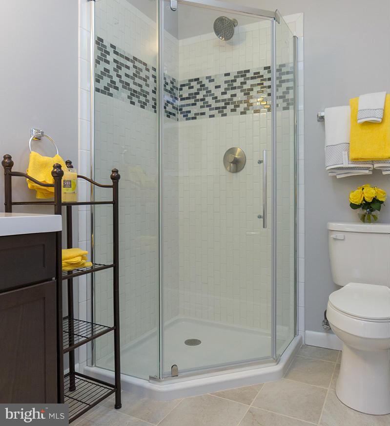 3810 Sweet Air Road Phoenix, MD 21131 - Photo 10 of 30 a bathroom with a shower toilet and sink