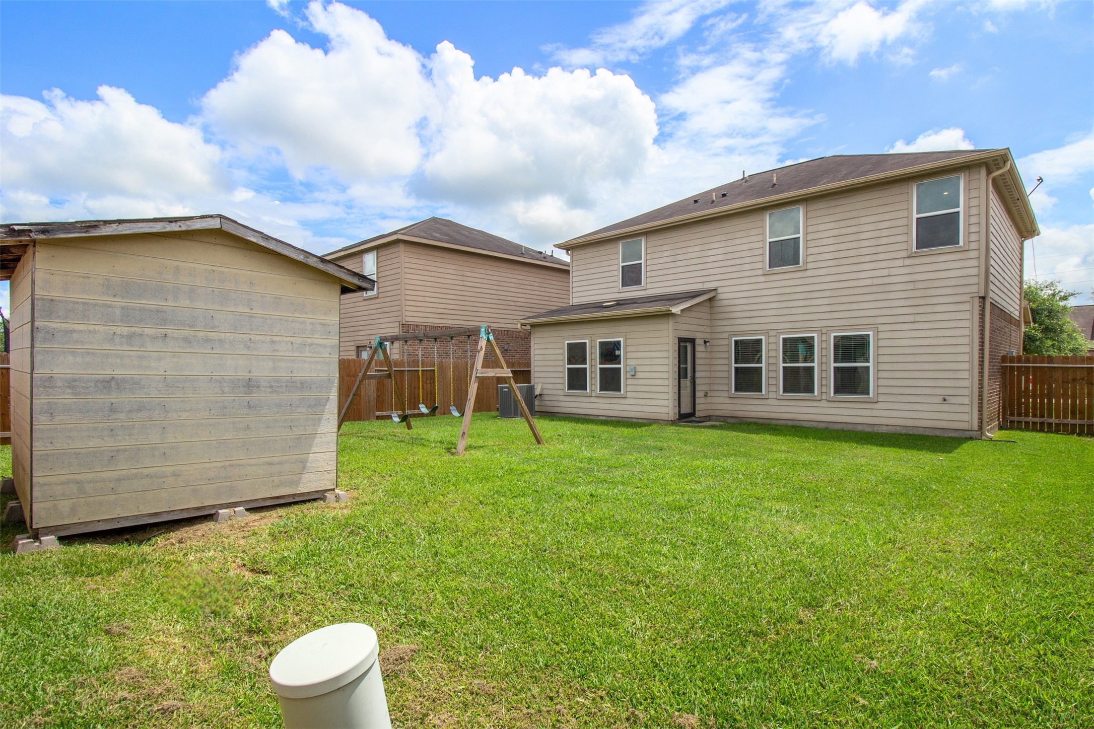 9426 Grand Spark Drive Rosharon, TX 77583 - Photo 23 of 31 Whether you envision lush landscaping, a garden retreat, or an outdoor entertaining area, this blank canvas is full of possibilities.