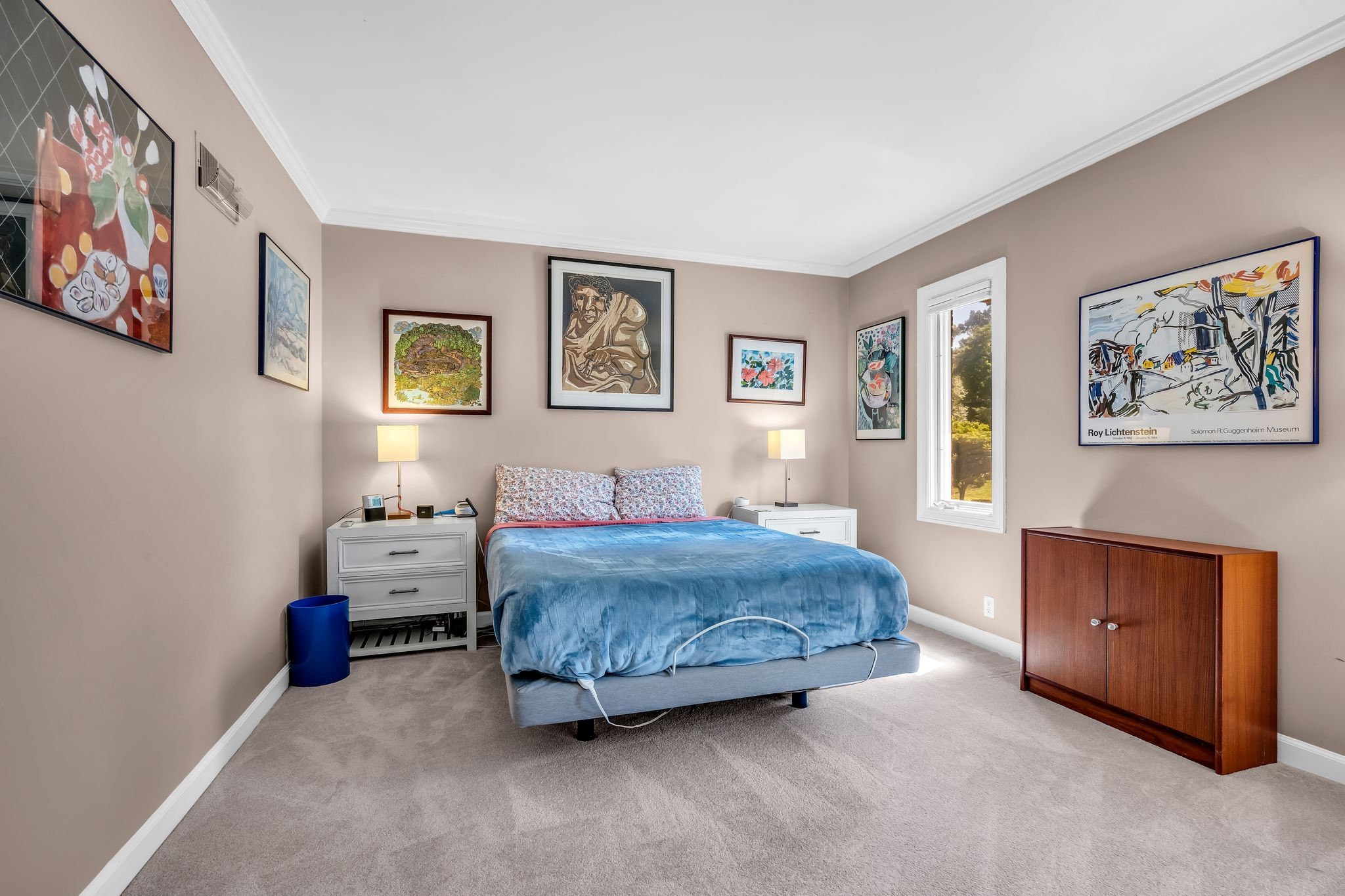 694 Timber Lane Nashville, TN 37215 - Photo 23 of 30 a spacious bedroom with a bed and painting on the wall
