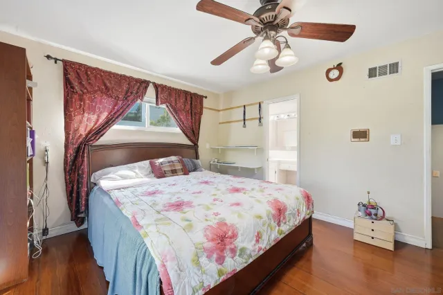 a bathroom with a sink a large mirror and a shower