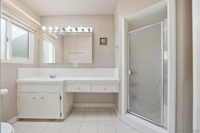 a view of a livingroom with a car parked in it