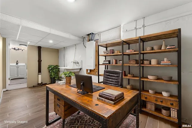 a view of a workspace with furniture