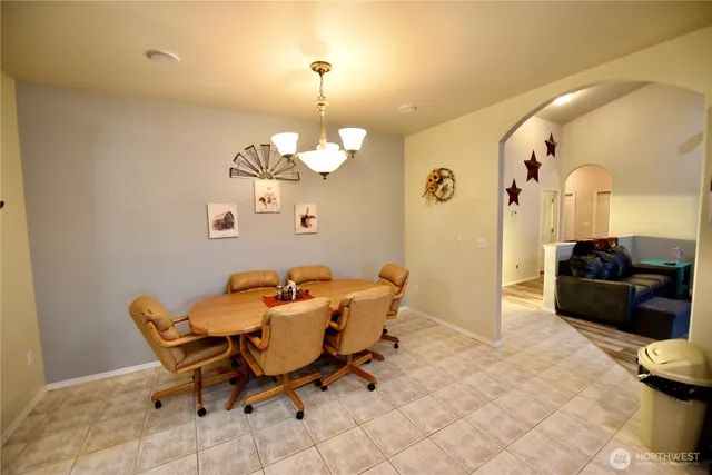 a view of a dining room with furniture