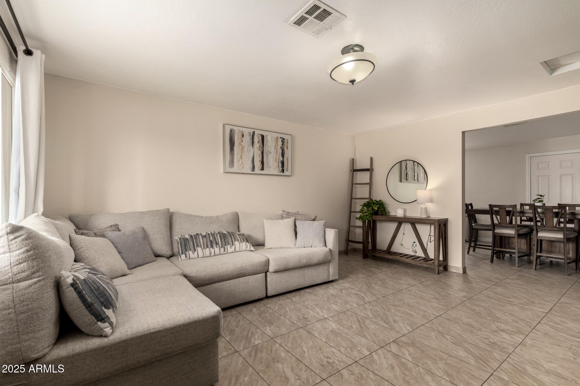 2024 West Roeser Road Phoenix, AZ 85041 - Photo 10 of 36 a living room with furniture