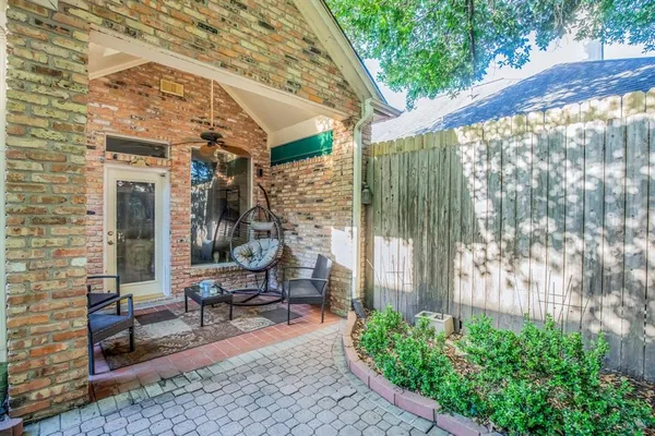 a house view with a sitting space and garden view