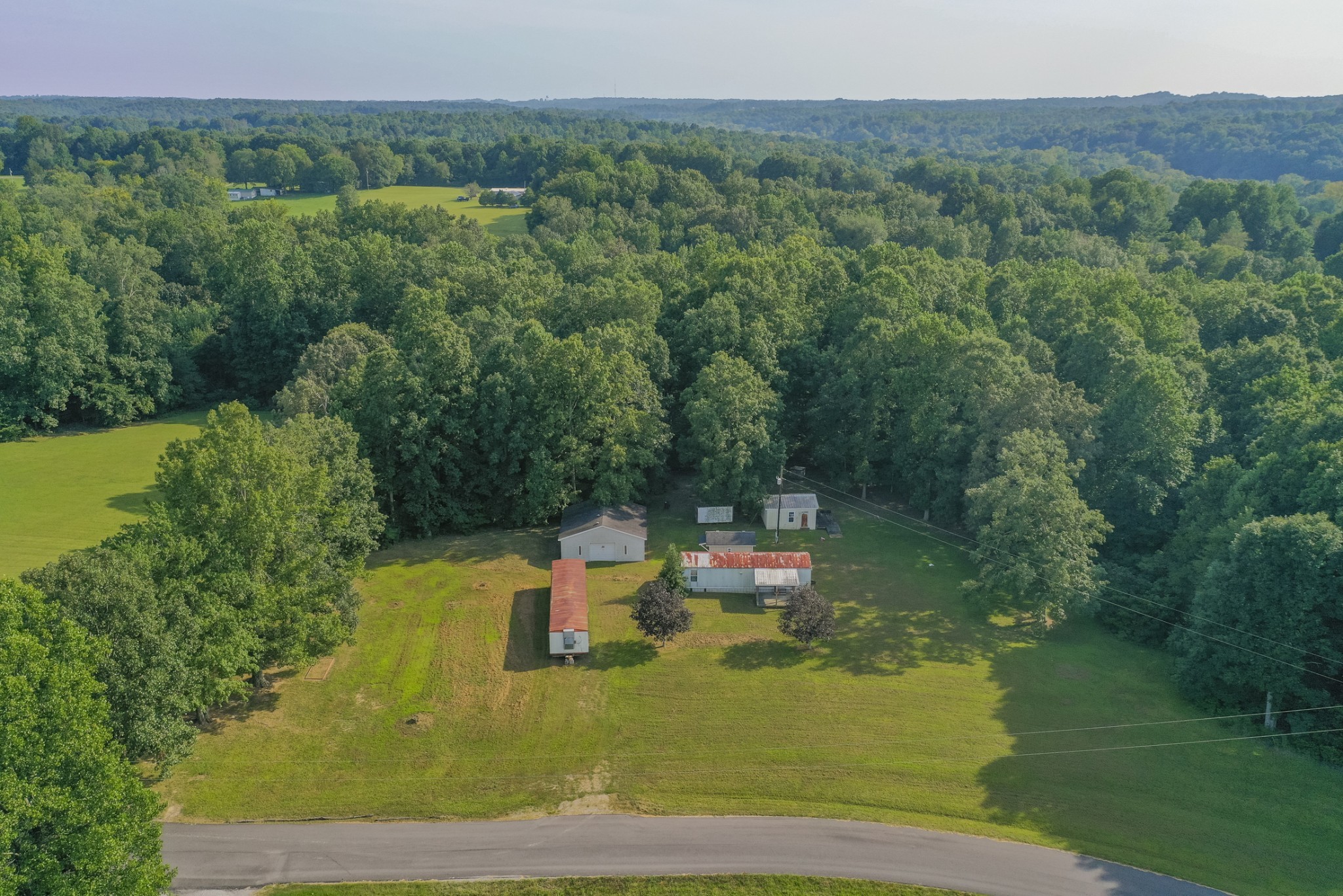 274 Running Meadows Road Portland, TN 37148 - Photo 2 of 24 a view of a house with a yard