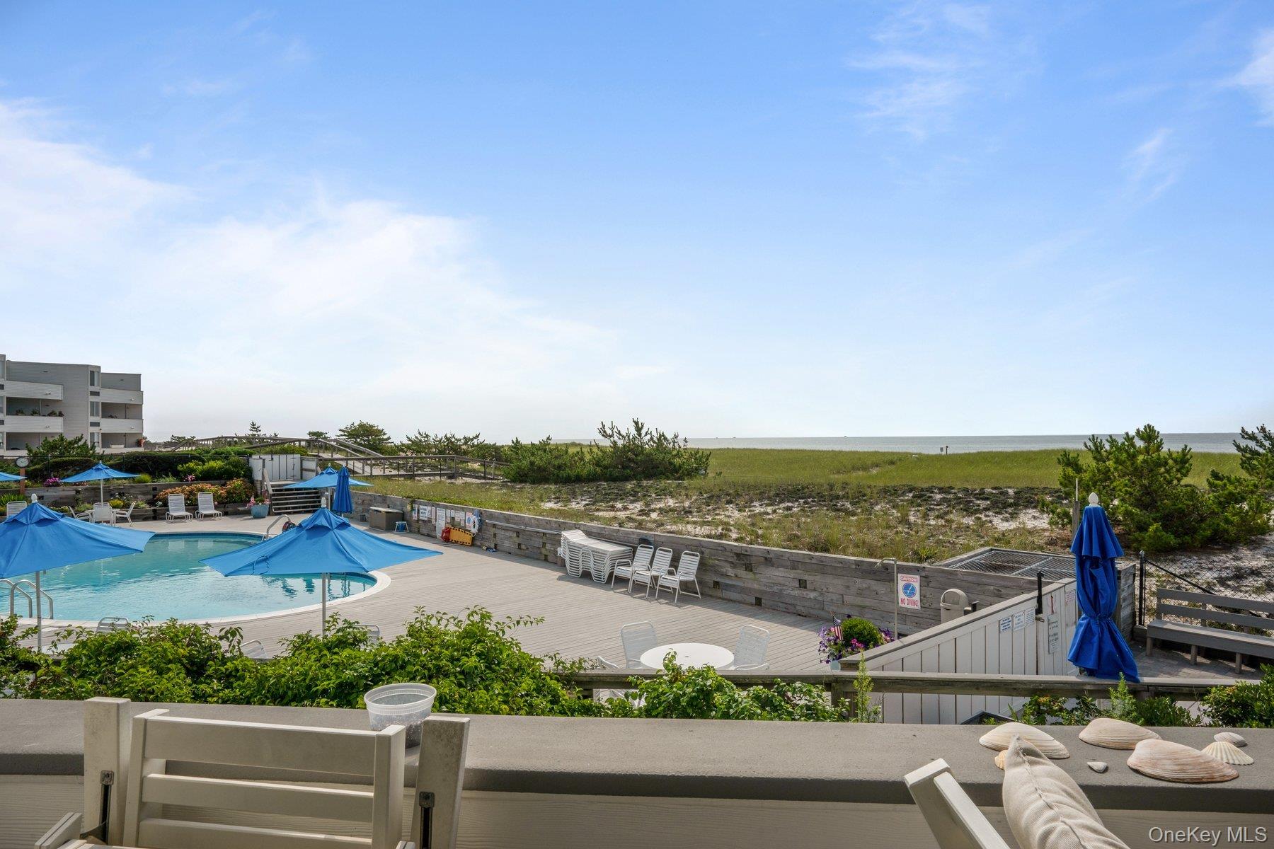 260 Dune Road, Unit 101G Westhampton Beach, NY 11978 - Photo 15 of 16 an aerial view of a city