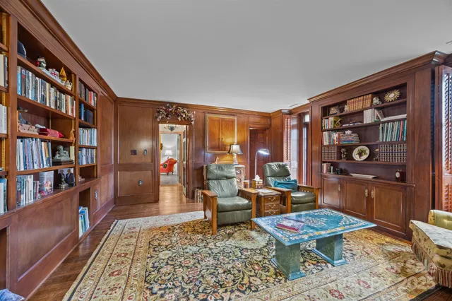 a kitchen with granite countertop a sink cabinets and window
