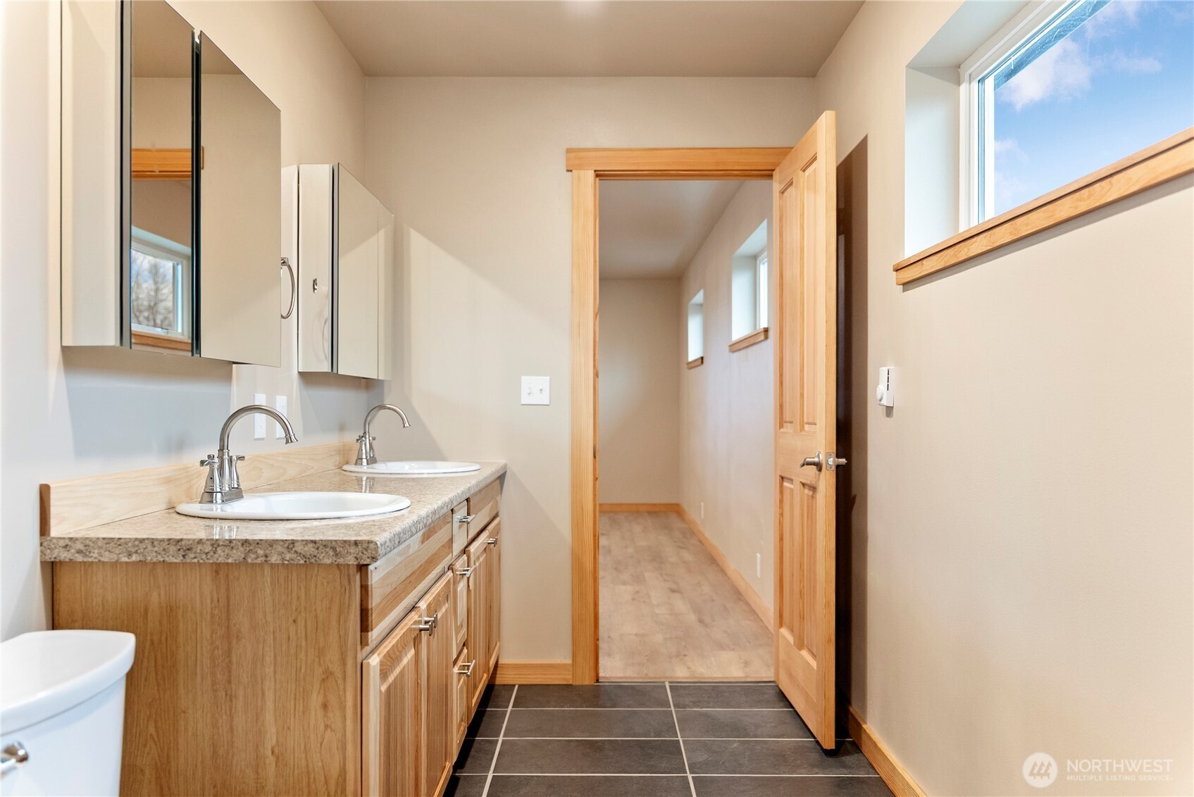 1110 Riverside Avenue Twisp, WA 98856 - Photo 17 of 28 a bathroom with a sink and a mirror