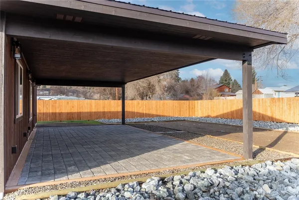 a view of a back yard from a balcony