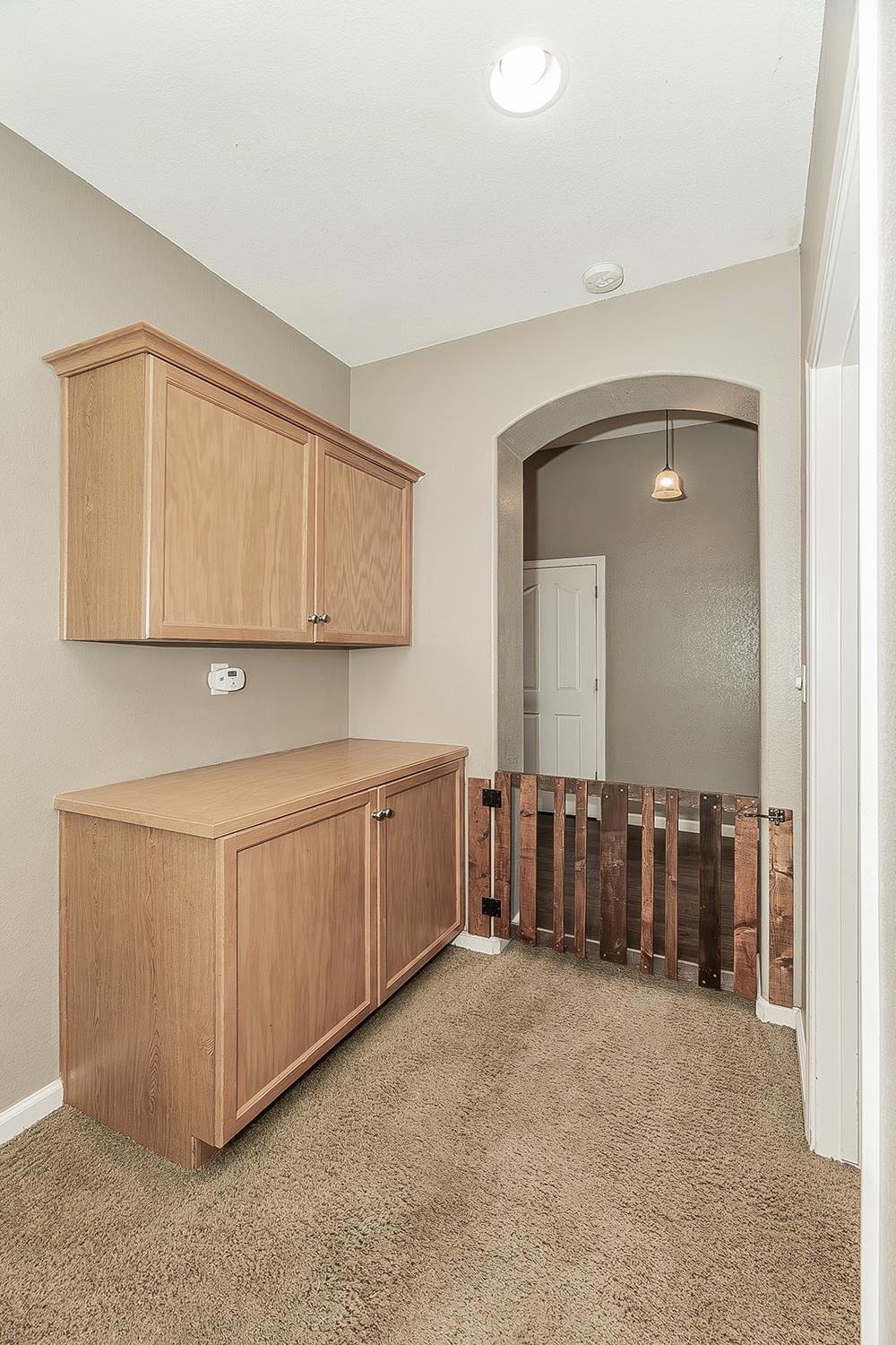 7357 East Redlands Avenue Fresno, CA 93737 - Photo 20 of 59 Built-in cabinets at the Hallway