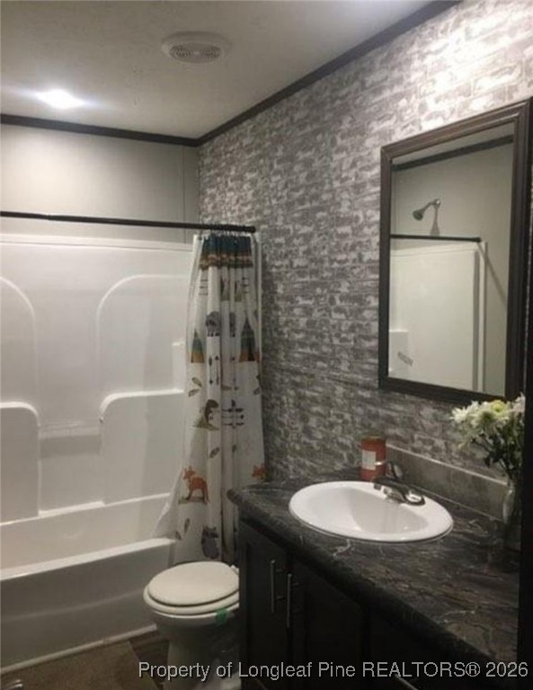 2754 Snipes Road Red Springs, NC 28377 - Photo 18 of 25 a bathroom with a sink toilet and shower