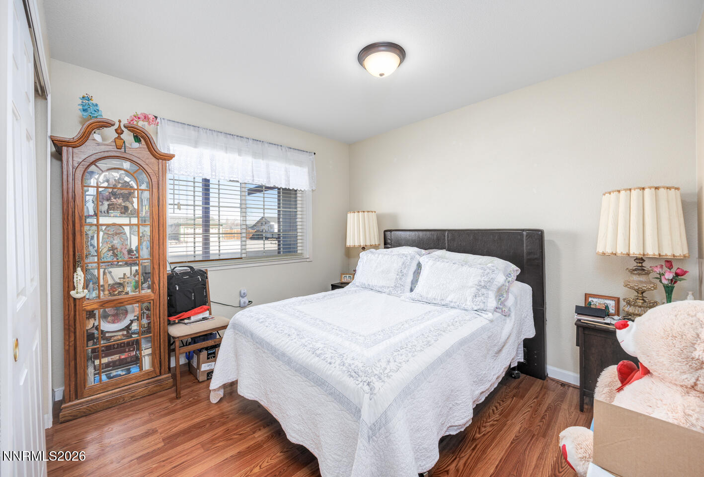 2885 Dallas Drive Fallon, NV 89406 - Photo 11 of 27 a bedroom with a bed and wooden floor