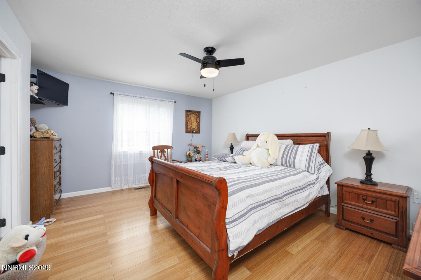 2885 Dallas Drive Fallon, NV 89406 - Photo 13 of 27 a view of bedroom with furniture and wooden floor