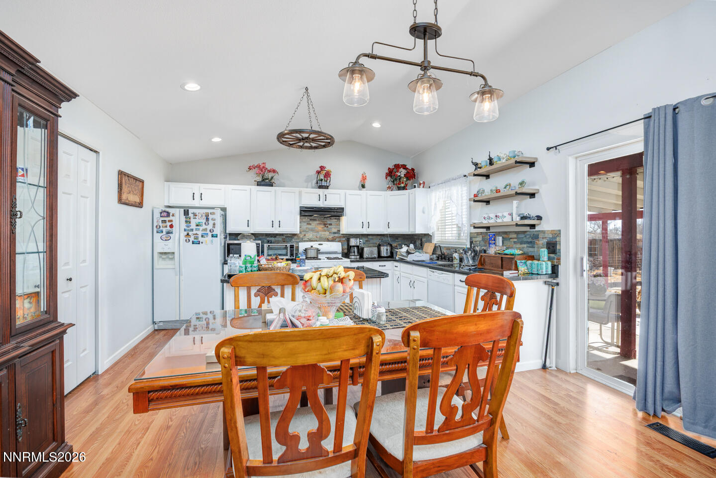 2885 Dallas Drive Fallon, NV 89406 - Photo 5 of 27 a view of a dining room with furniture wooden floor and chandelier