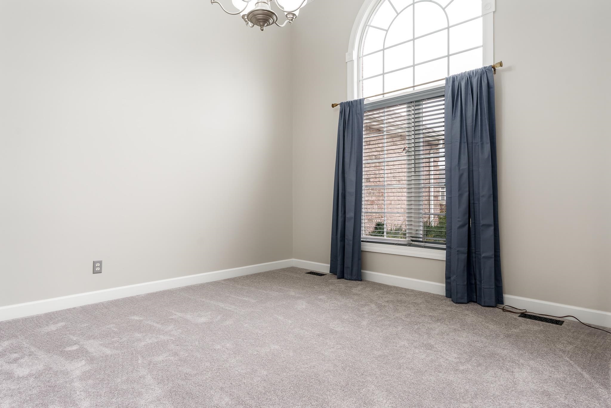 664 Elberon Way Roscoe, IL 61073 - Photo 12 of 63 an empty room with windows