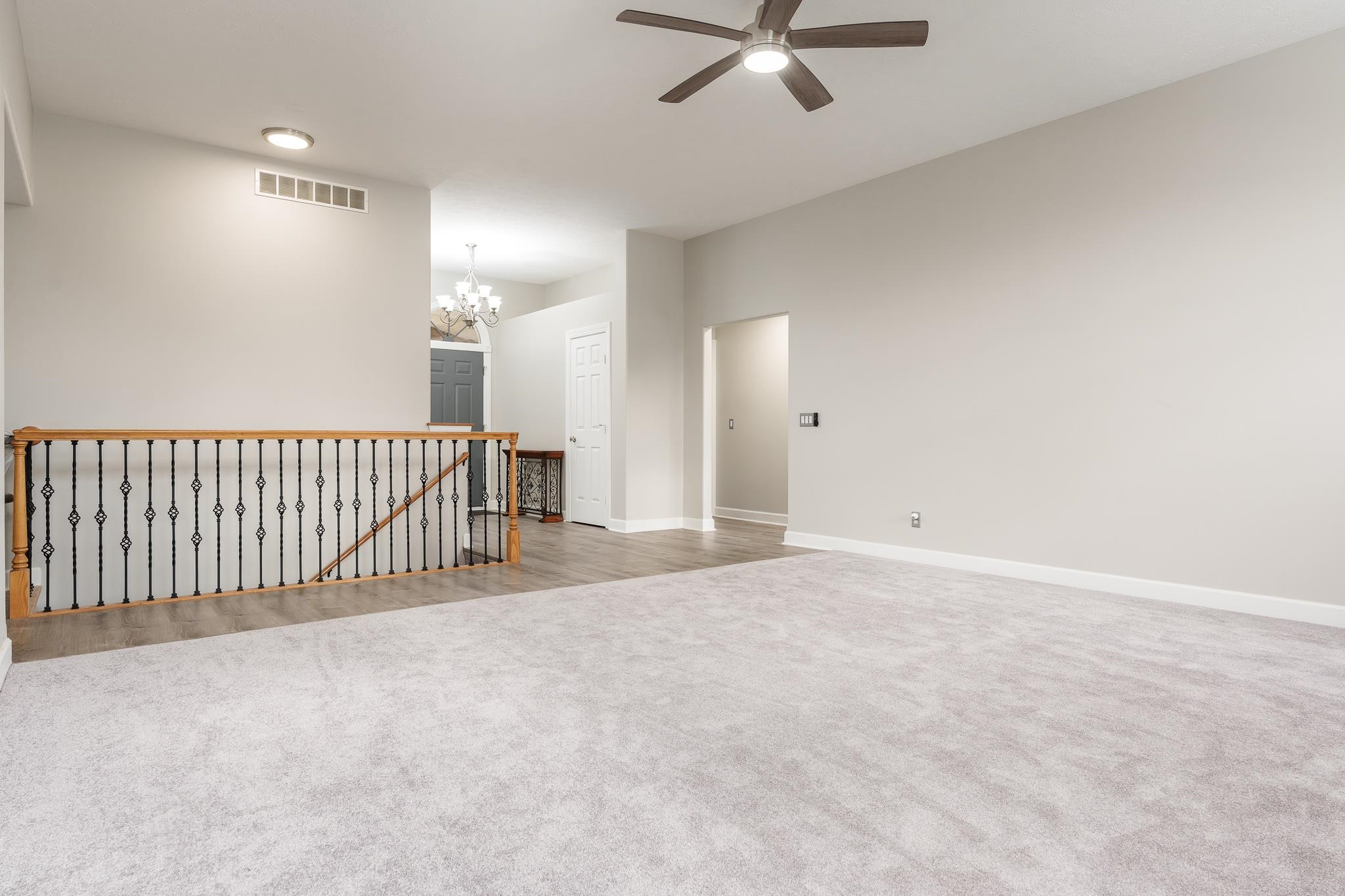664 Elberon Way Roscoe, IL 61073 - Photo 17 of 63 a view of a livingroom with a staircase