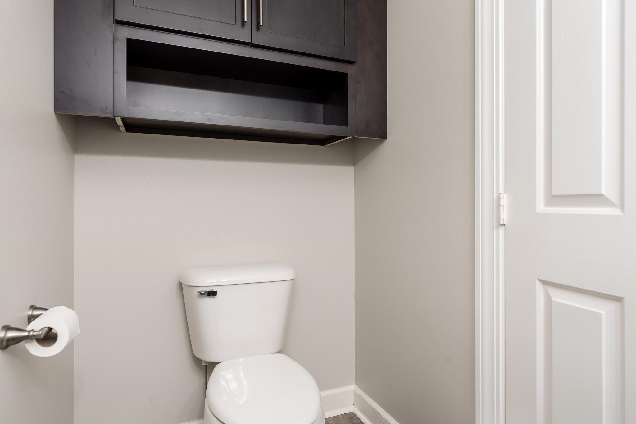 664 Elberon Way Roscoe, IL 61073 - Photo 26 of 63 a bathroom with a toilet and a sink