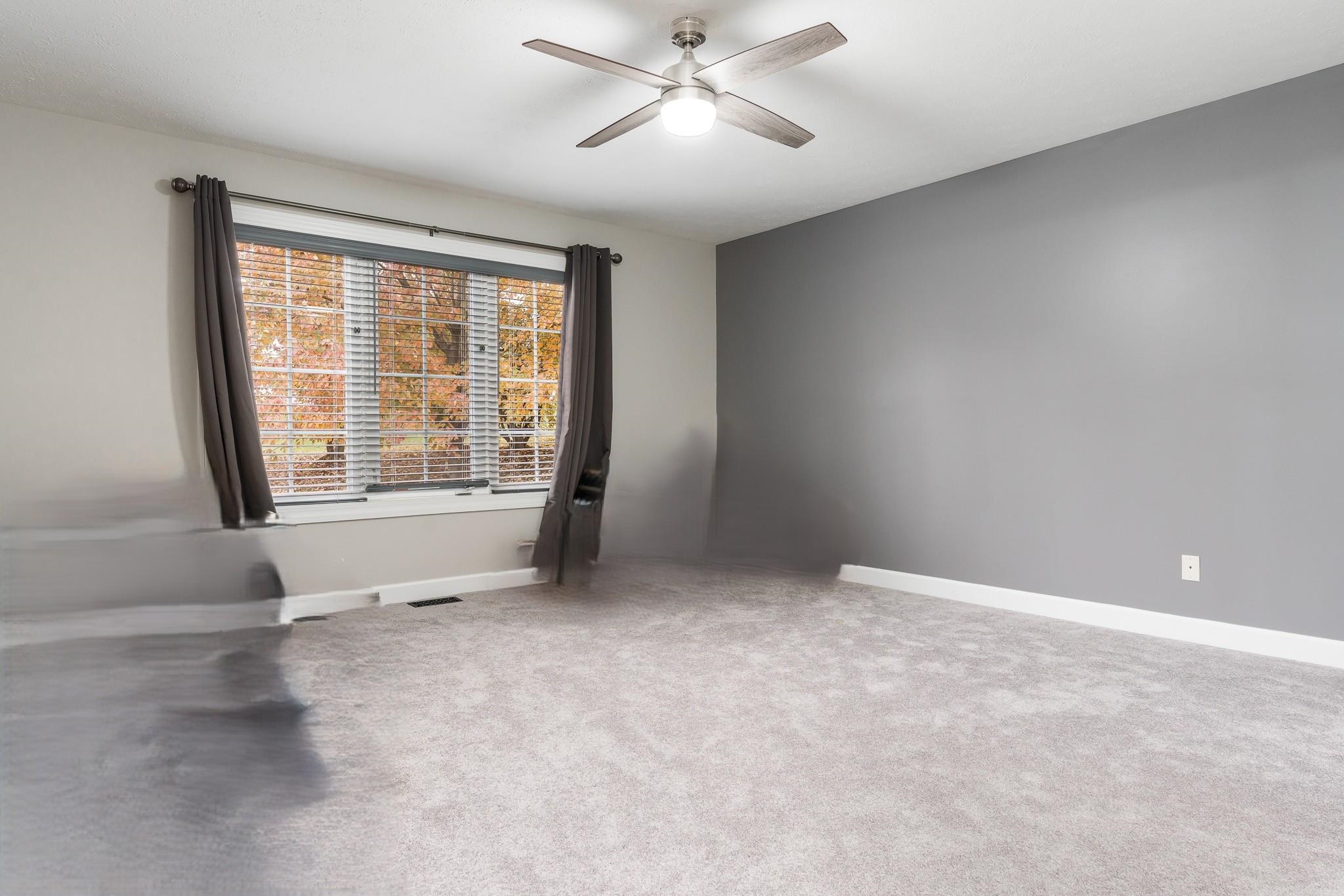 664 Elberon Way Roscoe, IL 61073 - Photo 27 of 63 a view of an empty room with a window