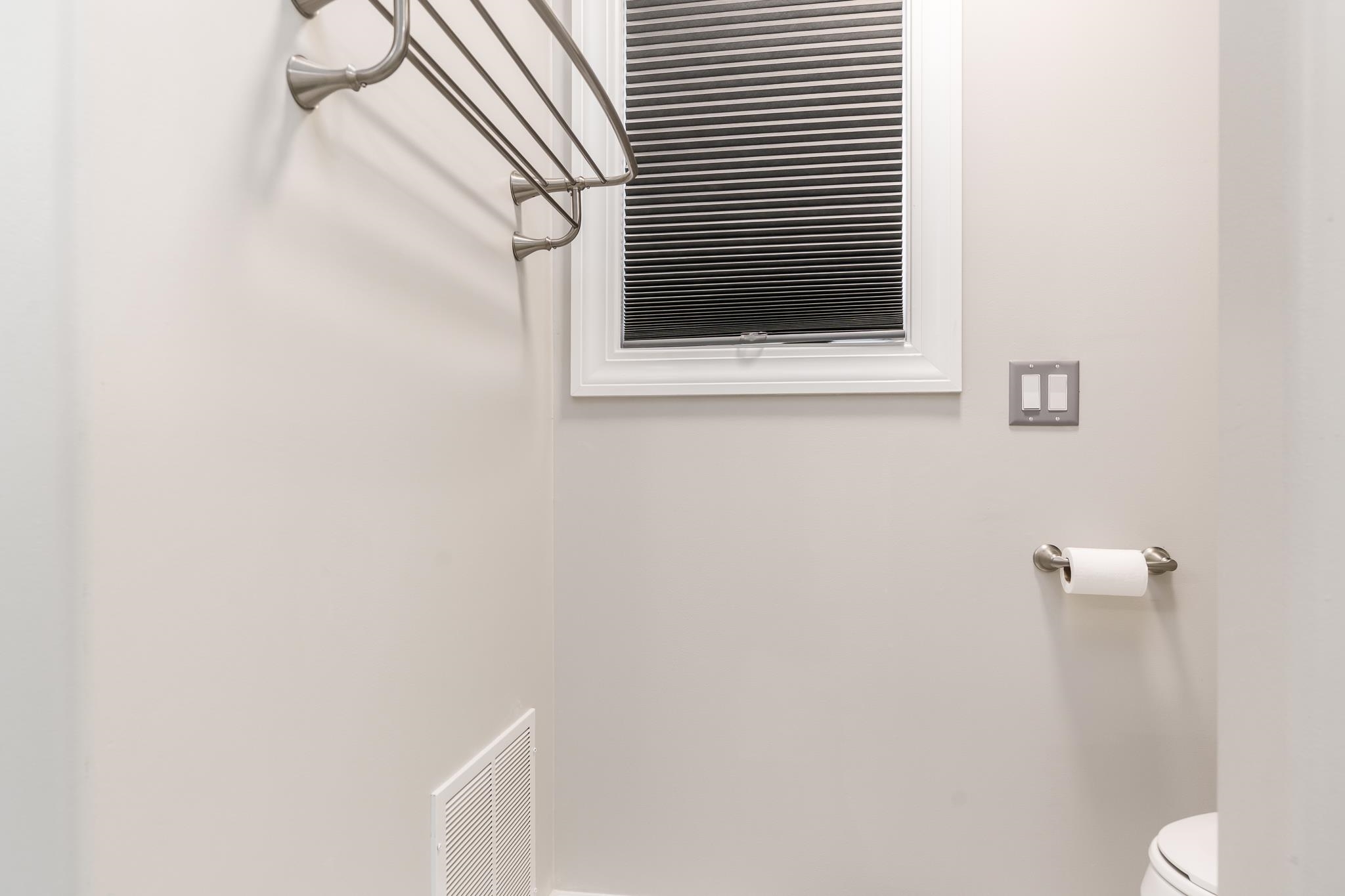 664 Elberon Way Roscoe, IL 61073 - Photo 32 of 63 a bathroom with a window