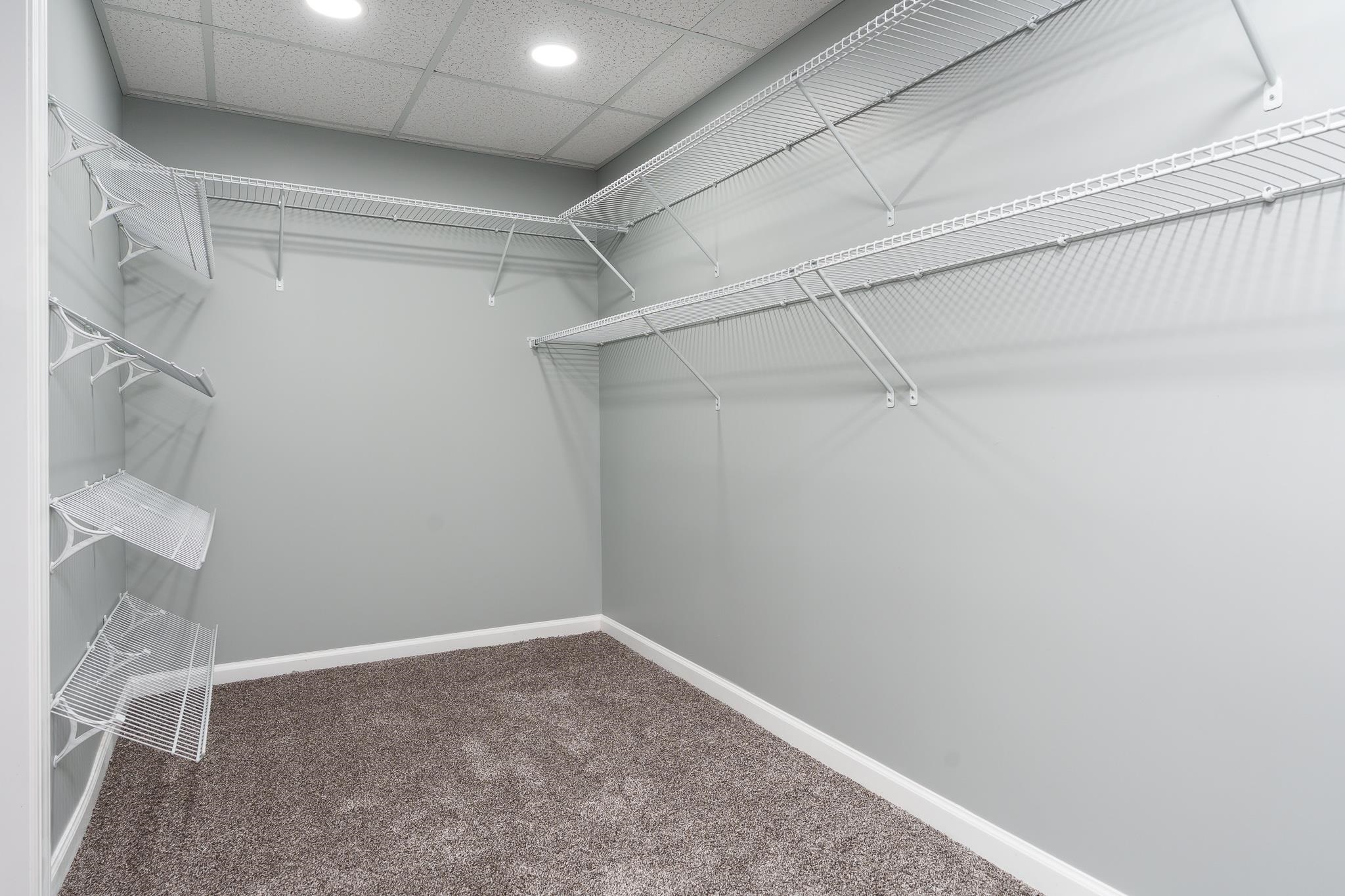 664 Elberon Way Roscoe, IL 61073 - Photo 49 of 63 a view of a room with racks on the wall