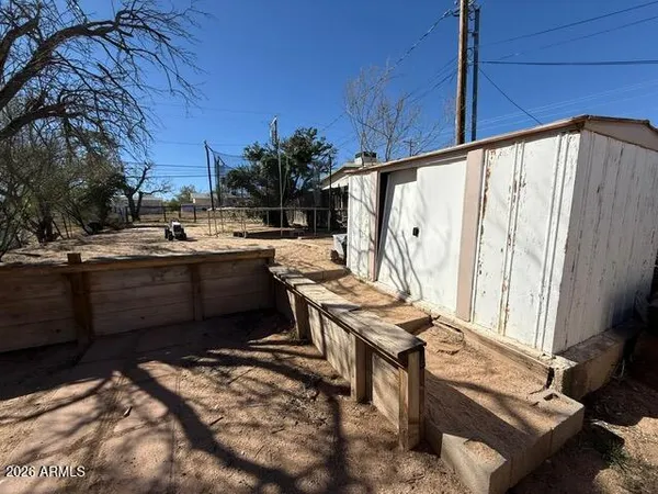 a kitchen with a sink appliances and cabinets