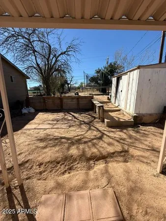 a view of swimming pool with patio