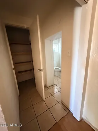 a view of a utility room with a door