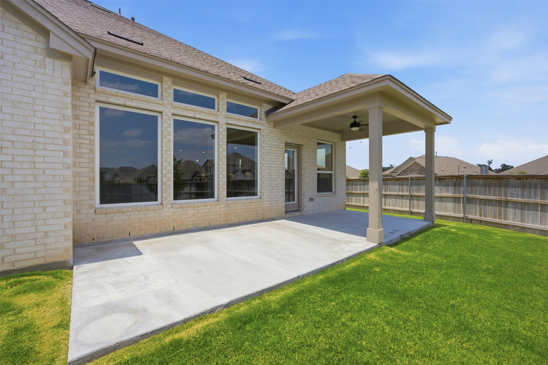 2101 Little Snake Way Georgetown, TX 78633 - Photo 34 of 37 A spacious backyard with a generous patio offers an ideal setting for outdoor living.