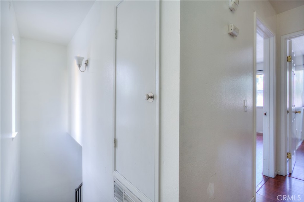 4853 Jackson Street, Unit C Riverside, CA 92503 - Photo 15 of 26 a view of a hallway with wooden floor