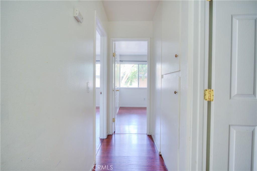 4853 Jackson Street, Unit C Riverside, CA 92503 - Photo 16 of 26 a view of hallway with wooden floor