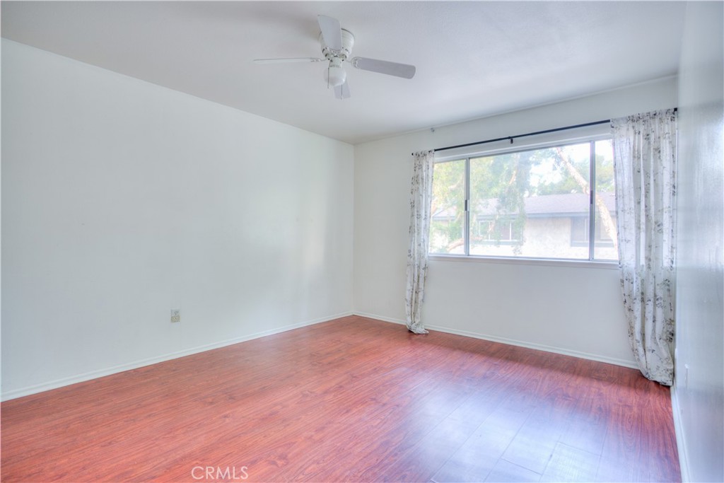 4853 Jackson Street, Unit C Riverside, CA 92503 - Photo 19 of 26 an empty room with a window