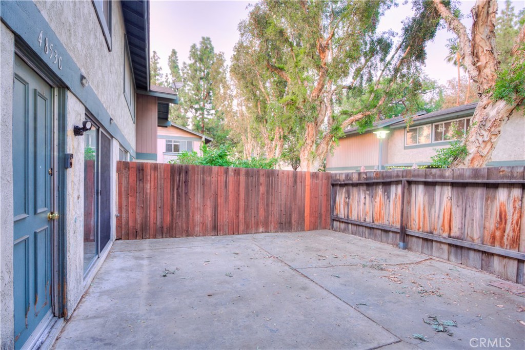 4853 Jackson Street, Unit C Riverside, CA 92503 - Photo 2 of 26 a view of wooden fence