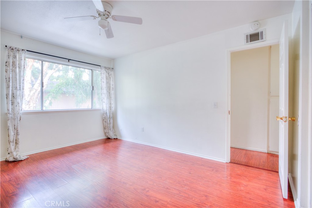 4853 Jackson Street, Unit C Riverside, CA 92503 - Photo 21 of 26 a view of an empty room with a window