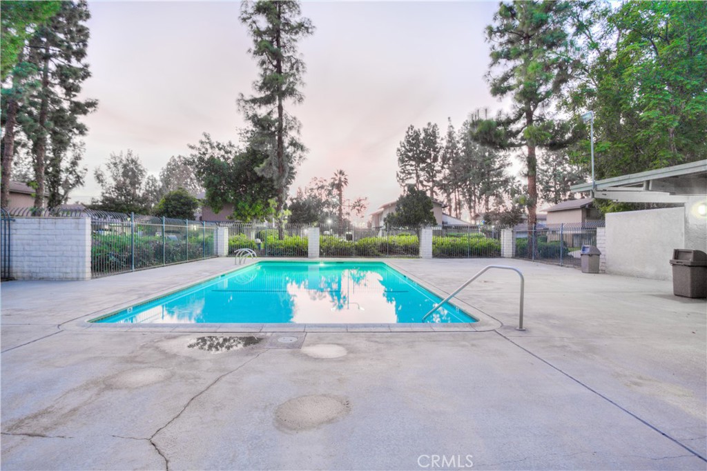 4853 Jackson Street, Unit C Riverside, CA 92503 - Photo 25 of 26 a view of yard with swimming pool and outdoor seating
