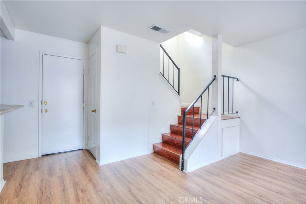 4853 Jackson Street, Unit C Riverside, CA 92503 - Photo 10 of 26 a view of entryway and hall with wooden floor