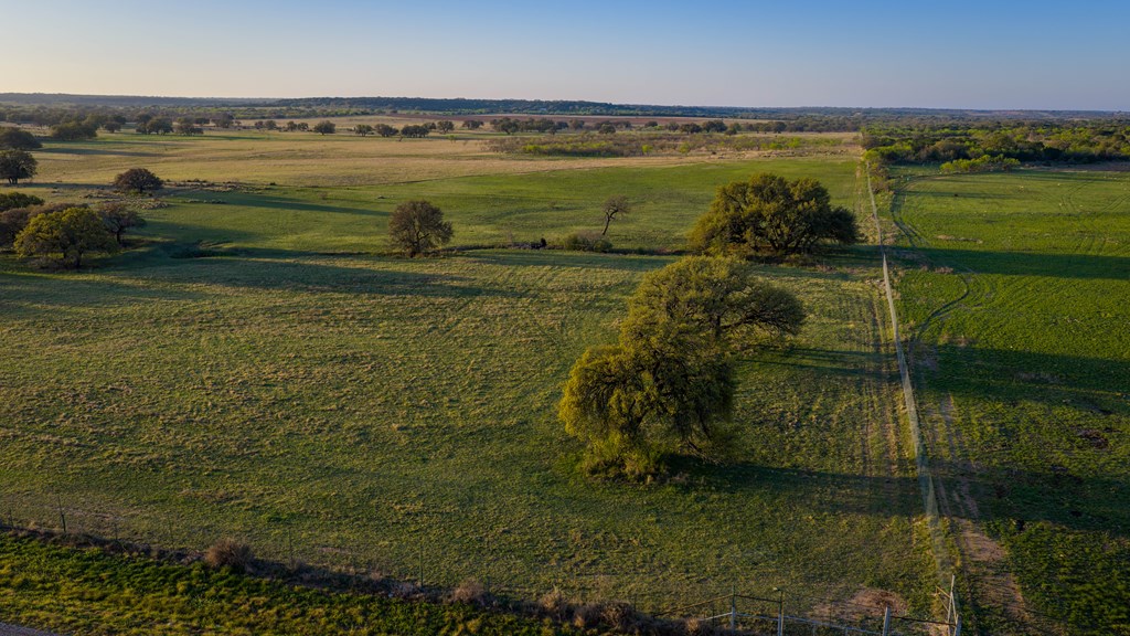 348 Blau Lane Hext, TX 76848 - Photo 37 of 94 a view of a lake with a yard