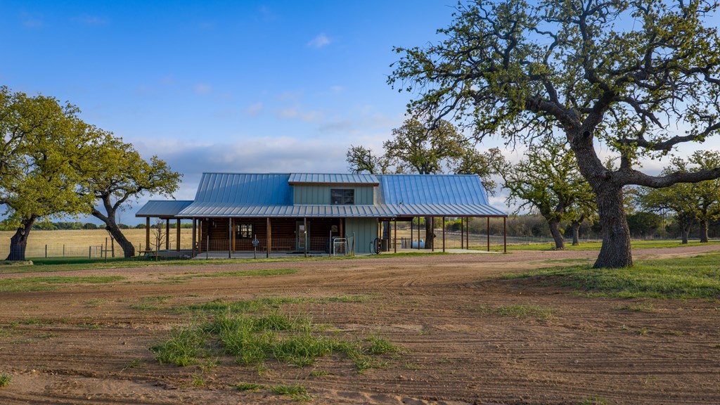 348 Blau Lane Hext, TX 76848 - Photo 41 of 94 a front view of a house with a yard