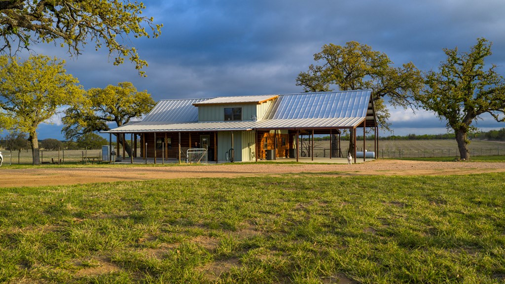 348 Blau Lane Hext, TX 76848 - Photo 56 of 94 a view of house with outdoor space and garden