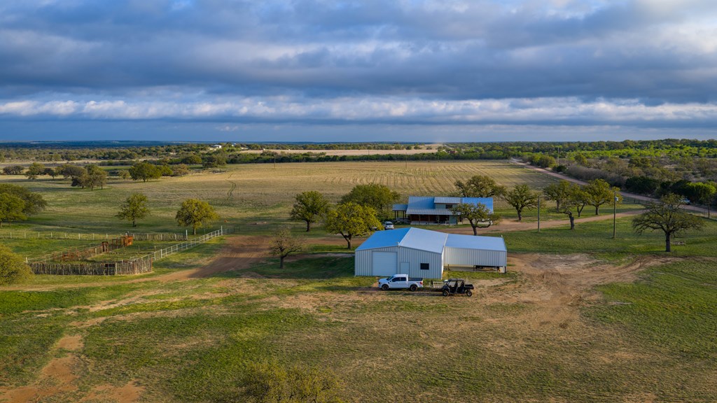 348 Blau Lane Hext, TX 76848 - Photo 57 of 94 a view of a lake with a car parked in the background