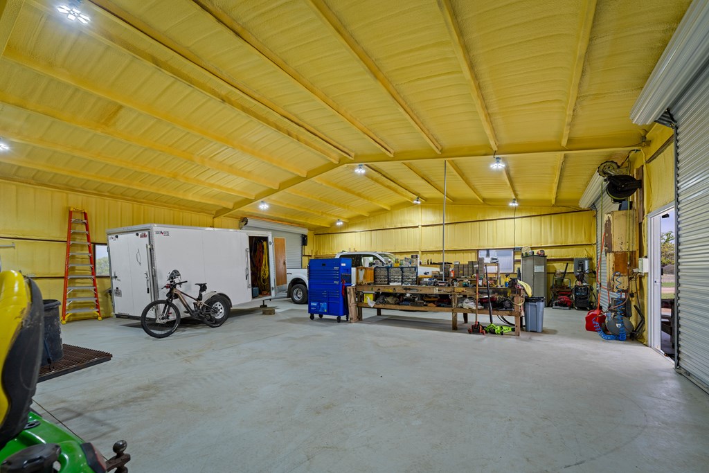 348 Blau Lane Hext, TX 76848 - Photo 76 of 94 a view of a garage with cars