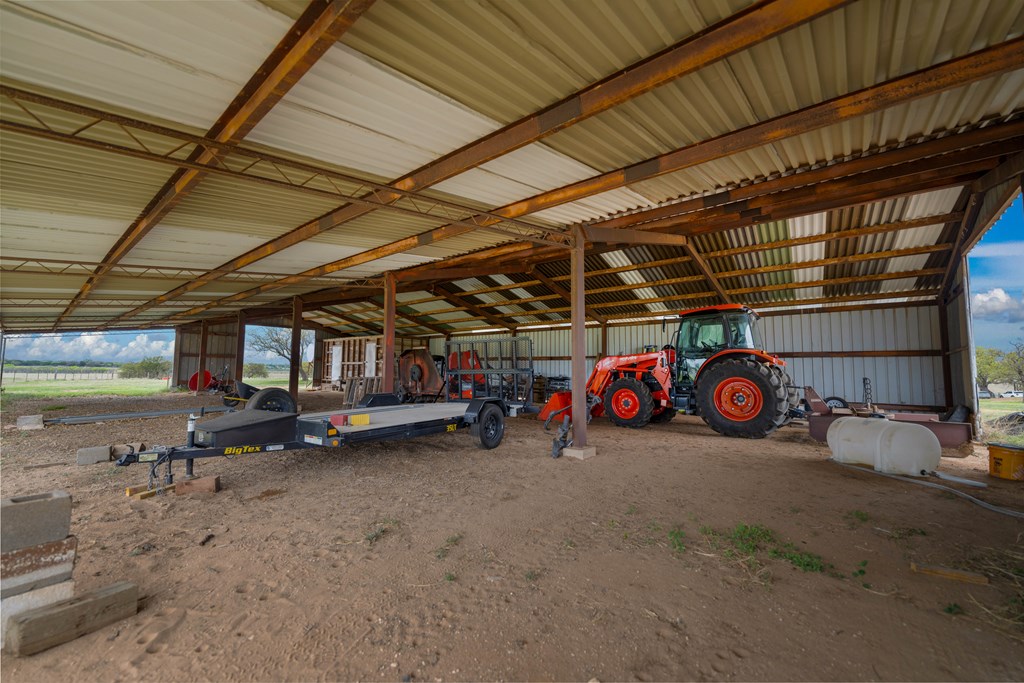 348 Blau Lane Hext, TX 76848 - Photo 81 of 94 a view of a garage with wooden roof