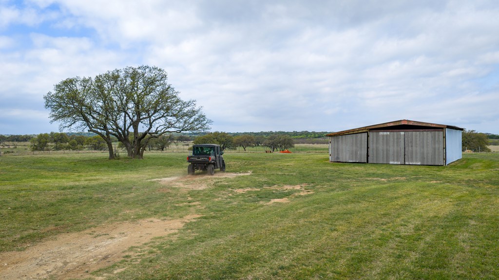 348 Blau Lane Hext, TX 76848 - Photo 84 of 94 a backyard of a house with lots of green space