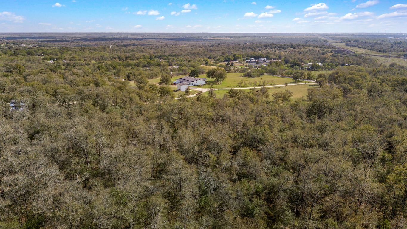 1710 Bock Road Buda, TX 78610 - Photo 13 of 21 an aerial view of residential houses with outdoor space
